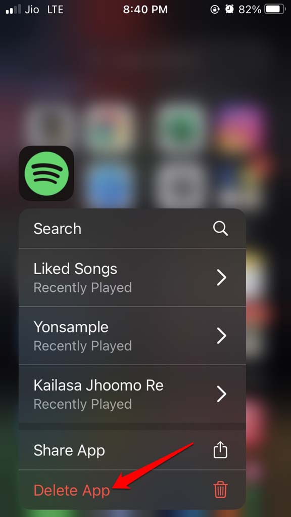 удалить Spotify на iPhone